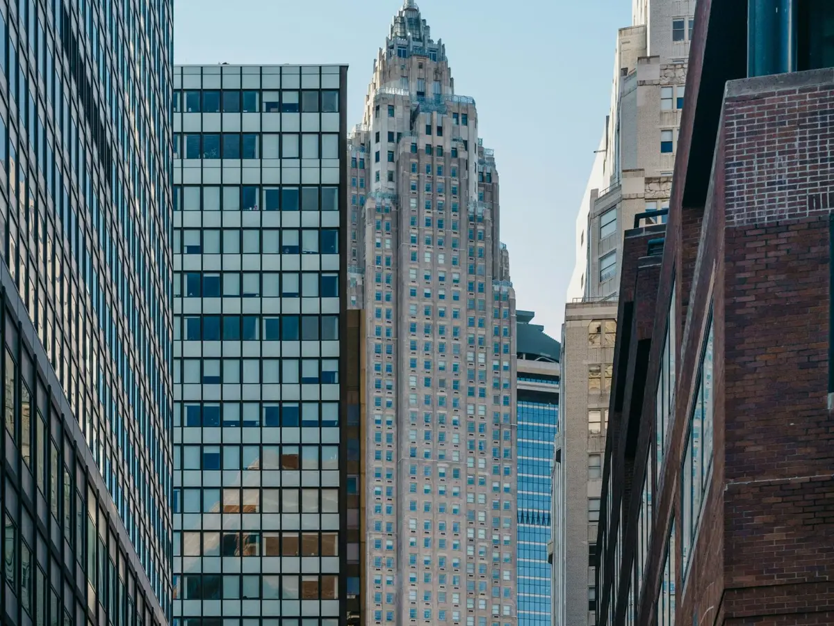 A downtown financial district street lined with office buildings